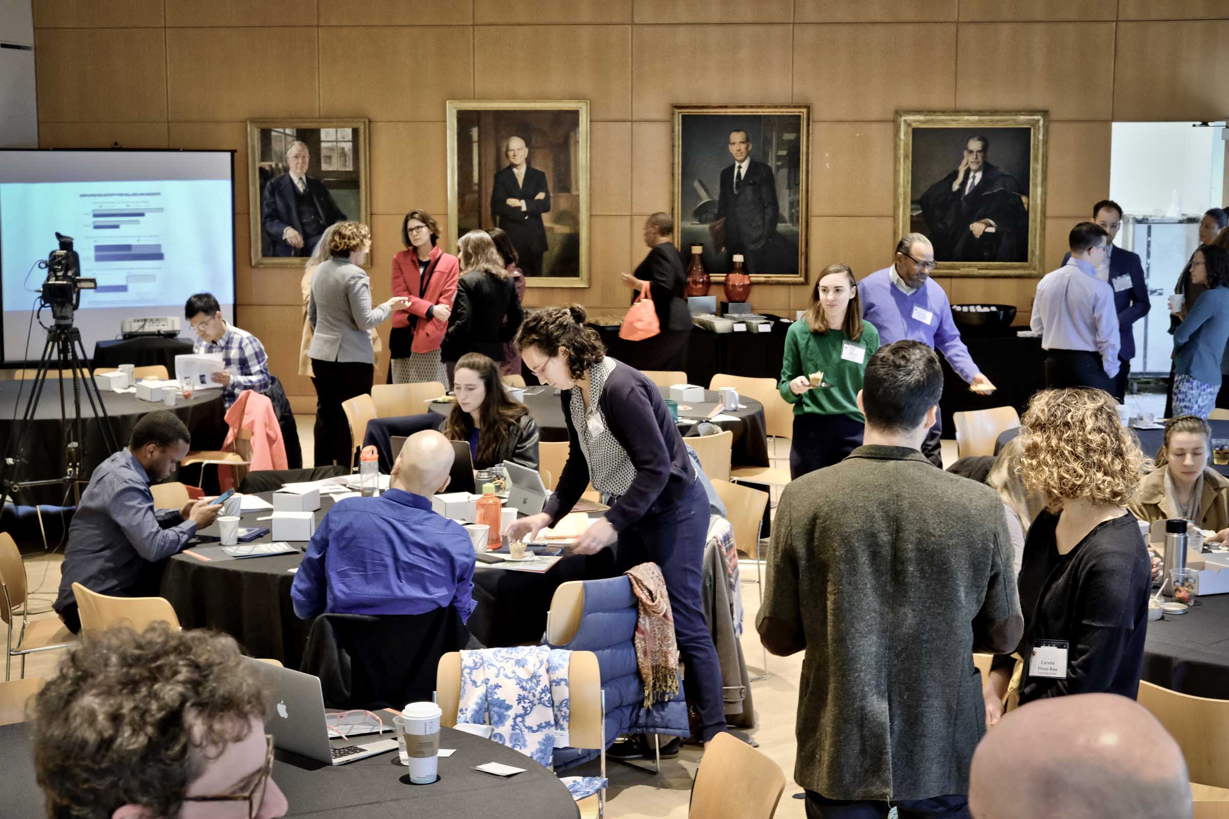 Conference participants mingle